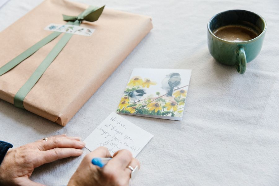 Holly Wach gift wraps her fine art songbird watercolor prints